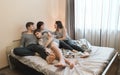 Family Relaxing Together In BedÃÅ½ Happy family concept Royalty Free Stock Photo